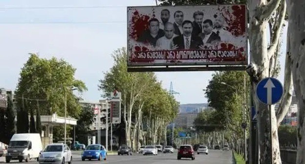 Anti-opposition banner in Tbilisi. Photo by Inna Kukudzhanova Anti-opposition banner in Tbilisi. Photo by Inna Kukudzhanova