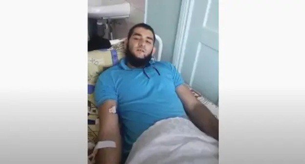 Alexei Dinisenko in a hospital. Screenshot: http://www.youtube.com/watch?v=7cY2mPnlxV4 Alexei Dinisenko in a hospital. Screenshot: http://www.youtube.com/watch?v=7cY2mPnlxV4