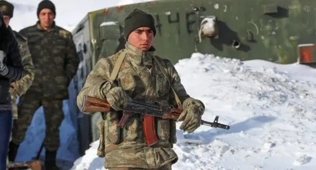 Azerbaijani serviceman in the Kelbajar Region of Nagorno-Karabakh in late December, 2020. Photo by Aziz Karimov for the Caucasian Knot Azerbaijani serviceman in the Kelbajar Region of Nagorno-Karabakh in late December, 2020. Photo by Aziz Karimov for the Caucasian Knot