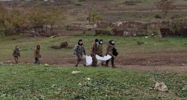 The Azerbaijani party has handed the remains of a military who perished during the hostilities in Nagorno-Karabakh over to Karabakh rescuers. Photo https://www.facebook.com/RescueServiceOfTheNKR The Azerbaijani party has handed the remains of a military who perished during the hostilities in Nagorno-Karabakh over to Karabakh rescuers. Photo https://www.facebook.com/RescueServiceOfTheNKR