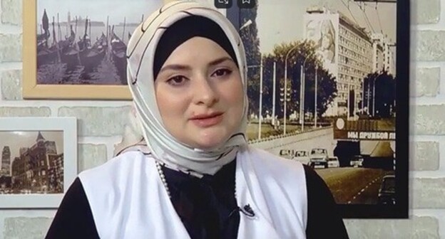 Dina Shagidaeva. Screenshot of the video by ANSAMBLE NOHCHO https://www.youtube.com/watch?v=T40yk9InrNg Dina Shagidaeva. Screenshot of the video by ANSAMBLE NOHCHO https://www.youtube.com/watch?v=T40yk9InrNg