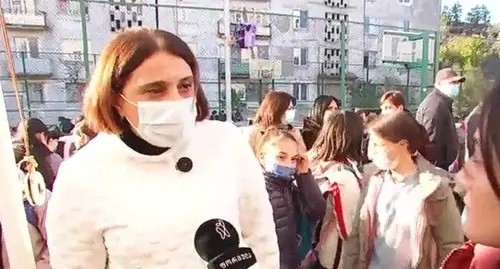 Participant of a teachers' protest rally in Tbilisi. Screenshot: https://formulanews.ge/News/59035 Participant of a teachers' protest rally in Tbilisi. Screenshot: https://formulanews.ge/News/59035