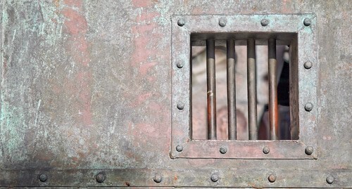 A prison cell door. Photo by ruslan2525 https://www.flickr.com/photos/ruslan2525/4466092738/in/photolist-7NDTLW-R6HQfm-2asYQc7-h6q1ri-6Jt6zY-ZveRmU-9YzFwz-arLw2X-R6HR33-R6HQJY-Zf4Meg-2gtfv5A-dycgxe-as48rh-arLw5X-dhPJJ3-qwdRF3-LhRCfW-7bmekh-52KLcX-YbVfq5-UtPHNH-3nVYtQ-3nVX8S-Yg4JoK-YzZuJr-4zBgFt-25ntFhx-niMRAn-5tXcYH-9evwa8-YAwYqz-YP8Xrn-dVYet5-Ywgeyw-aCESiH-dhPJJ6-YPakQi-BQmTG3-4AUGMV-e6ichS-Gcgb87-YAwbhn-GHHSti-5wfLxC-sPQmWg-9xqQdr-nZZqSb-5wbub8-ywb64 A prison cell door. Photo by ruslan2525 https://www.flickr.com/photos/ruslan2525/4466092738/in/photolist-7NDTLW-R6HQfm-2asYQc7-h6q1ri-6Jt6zY-ZveRmU-9YzFwz-arLw2X-R6HR33-R6HQJY-Zf4Meg-2gtfv5A-dycgxe-as48rh-arLw5X-dhPJJ3-qwdRF3-LhRCfW-7bmekh-52KLcX-YbVfq5-UtPHNH-3nVYtQ-3nVX8S-Yg4JoK-YzZuJr-4zBgFt-25ntFhx-niMRAn-5tXcYH-9evwa8-YAwYqz-YP8Xrn-dVYet5-Ywgeyw-aCESiH-dhPJJ6-YPakQi-BQmTG3-4AUGMV-e6ichS-Gcgb87-YAwbhn-GHHSti-5wfLxC-sPQmWg-9xqQdr-nZZqSb-5wbub8-ywb64