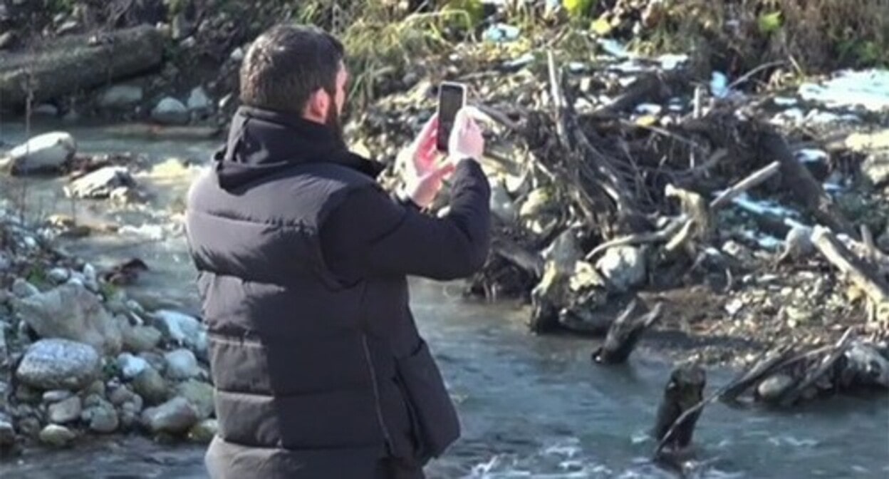 Magomed Daudov on a bank of the Fortanga River. Screenshot: https://www.instagram.com/p/CWjXYcVKsdm/ Magomed Daudov on a bank of the Fortanga River. Screenshot: https://www.instagram.com/p/CWjXYcVKsdm/