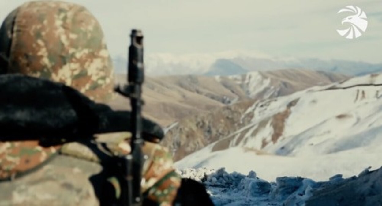 An Armenian soldier in combat position. Screenshot of the video by the press service of the Ministry of Defence of Armenia https://mil.am/hy/news/9921 An Armenian soldier in combat position. Screenshot of the video by the press service of the Ministry of Defence of Armenia https://mil.am/hy/news/9921