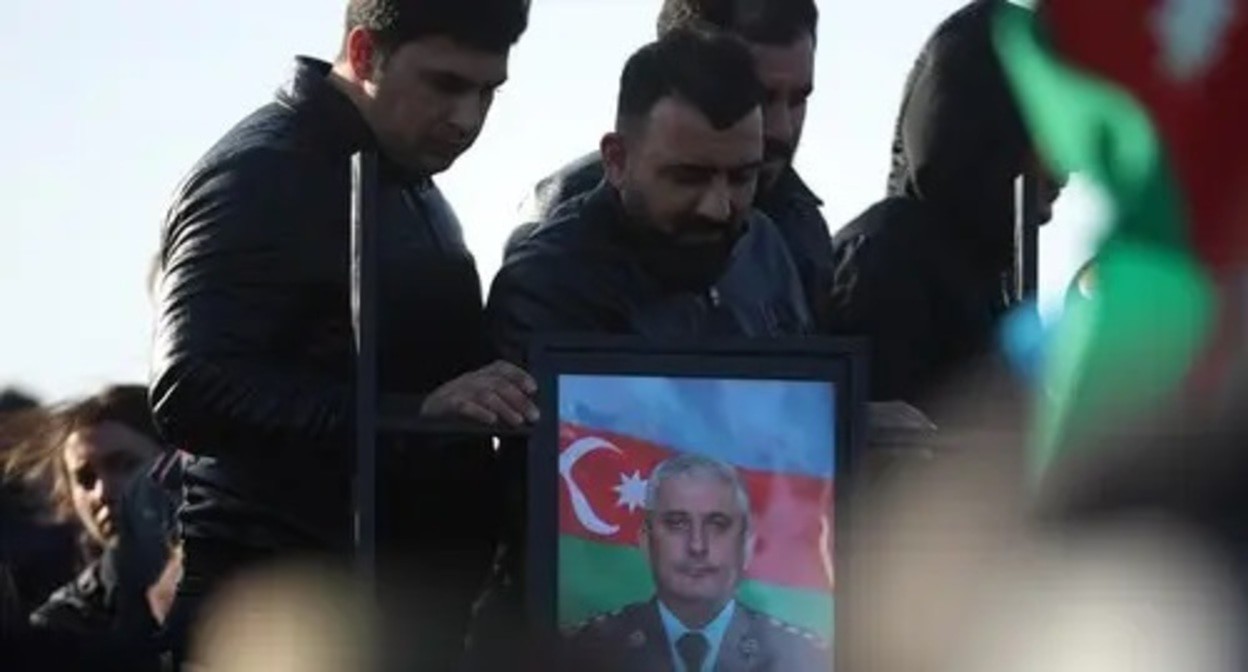 Portrait of a deceased officer at a funeral. Photo by Aziz Karimov for the Caucasian Knot Portrait of a deceased officer at a funeral. Photo by Aziz Karimov for the Caucasian Knot