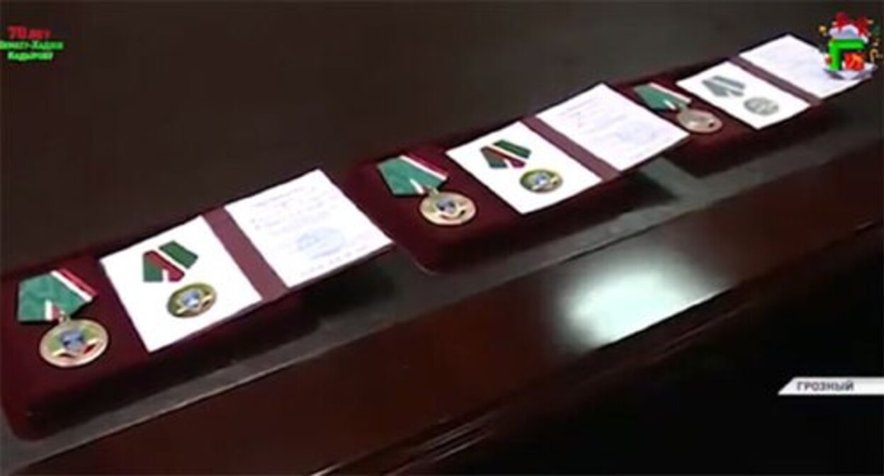 A medal for defending human rights of the Chechen people awarded to Ramzan Kadyrov and his parents. Screenshot of the video by the "Grozny" TV channel https://www.instagram.com/tv/CYGyTy-pZ7W/ A medal for defending human rights of the Chechen people awarded to Ramzan Kadyrov and his parents. Screenshot of the video by the "Grozny" TV channel https://www.instagram.com/tv/CYGyTy-pZ7W/