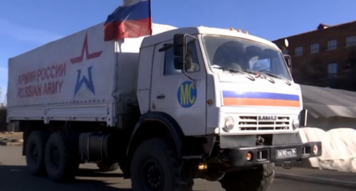 A vehicle of Russian peacekeepers delivers humanitarian aid to Nagorno-Karabakh. Photo: press service of the Russian Defense Ministry. A vehicle of Russian peacekeepers delivers humanitarian aid to Nagorno-Karabakh. Photo: press service of the Russian Defense Ministry.