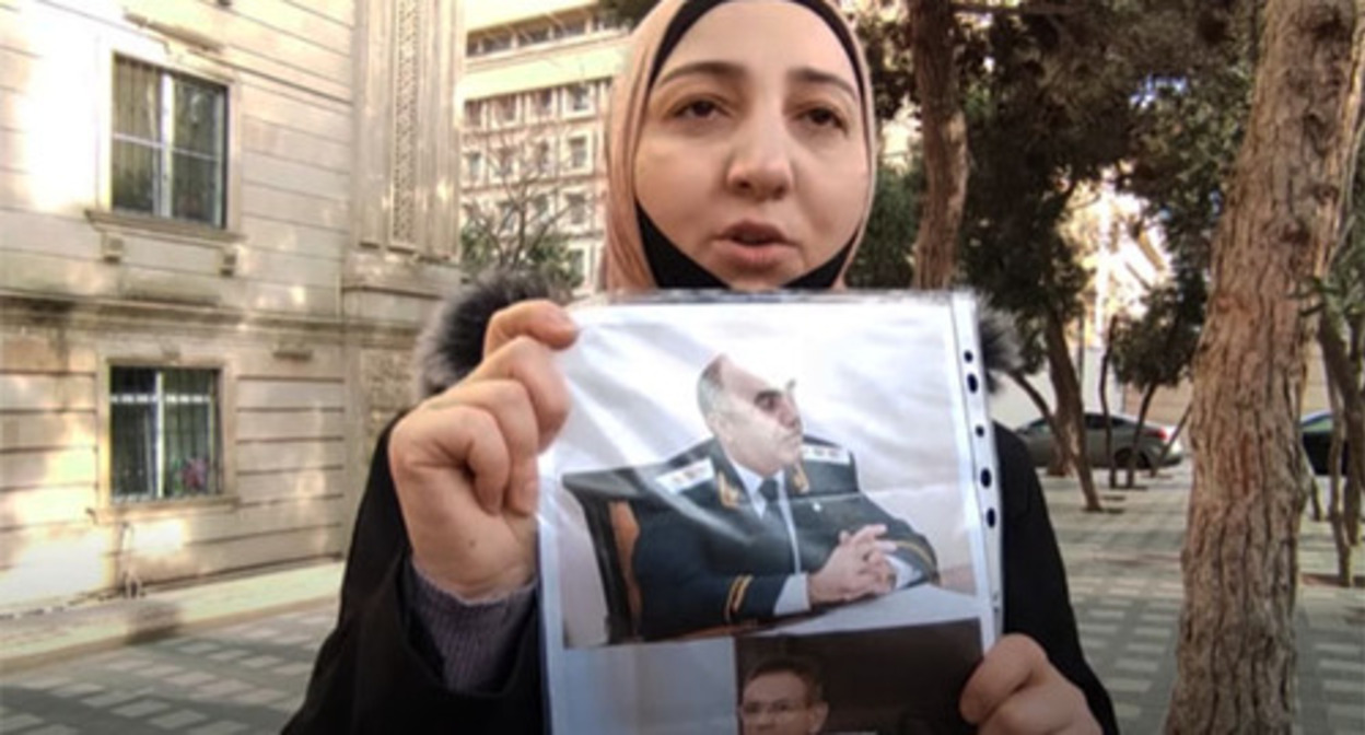 Gyulmira Aslanova, a spouse of journalist Polad Aslanov, at a protest action. Screenshot of the video https://www.youtube.com/watch?v=EWOkpKJ25aY Gyulmira Aslanova, a spouse of journalist Polad Aslanov, at a protest action. Screenshot of the video https://www.youtube.com/watch?v=EWOkpKJ25aY