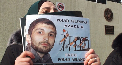 Poster with Polad Aslanov’s portrait. Screenshot: https://www.youtube.com/watch?v=MeItCVwfF20 Poster with Polad Aslanov’s portrait. Screenshot: https://www.youtube.com/watch?v=MeItCVwfF20