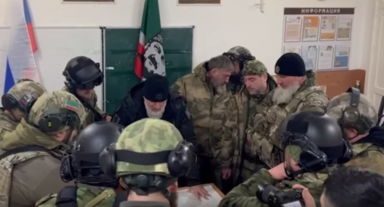Adam Delimkhanov and Chechen fighters participating in the military operation in Ukraine. Image made from the video posted at Ramzan Kadyrov's VK channel: https://vk.com/ramzan?w=wall279938622_777991 Adam Delimkhanov and Chechen fighters participating in the military operation in Ukraine. Image made from the video posted at Ramzan Kadyrov's VK channel: https://vk.com/ramzan?w=wall279938622_777991