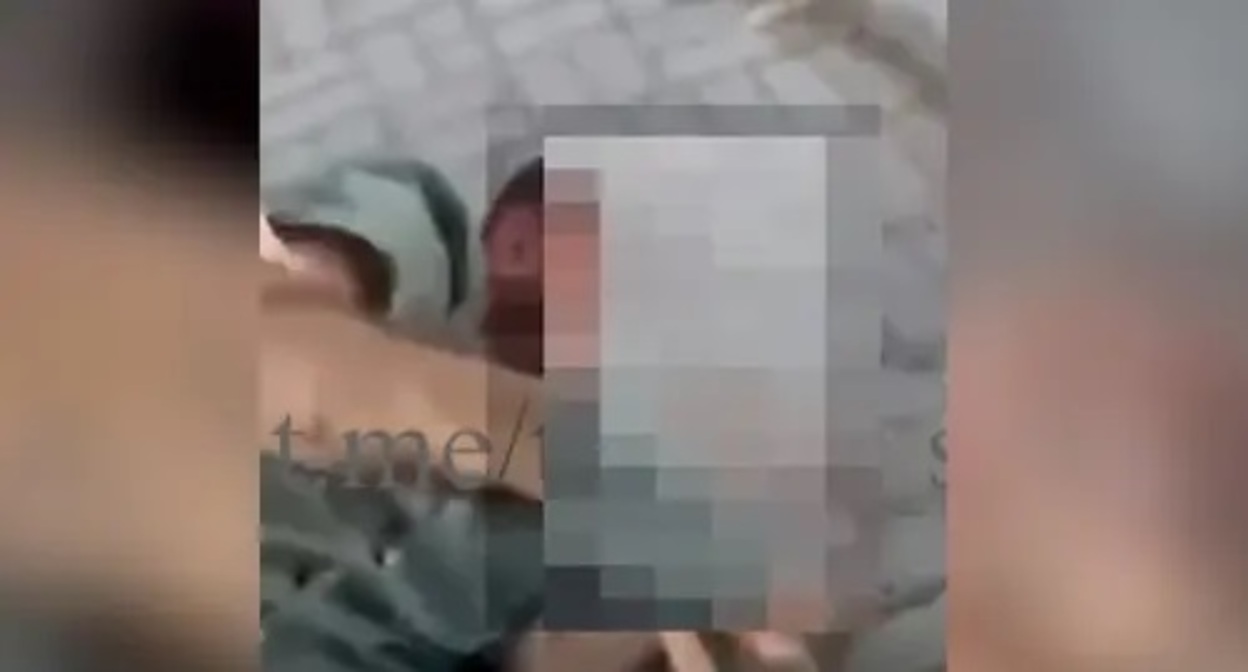 Footage of the beating of Beslan Edilov. Screenshot: https://www.youtube.com/watch?v=gixDyCGY9xY&t=63s Footage of the beating of Beslan Edilov. Screenshot: https://www.youtube.com/watch?v=gixDyCGY9xY&t=63s