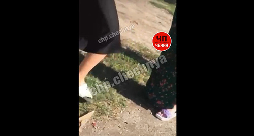 Screenshot of a video with an adult woman beating a teenage girl, Chechnya, July 30, 2022, Telegram-Channe ‘ChP/Grozny’ Screenshot of a video with an adult woman beating a teenage girl, Chechnya, July 30, 2022, Telegram-Channe ‘ChP/Grozny’