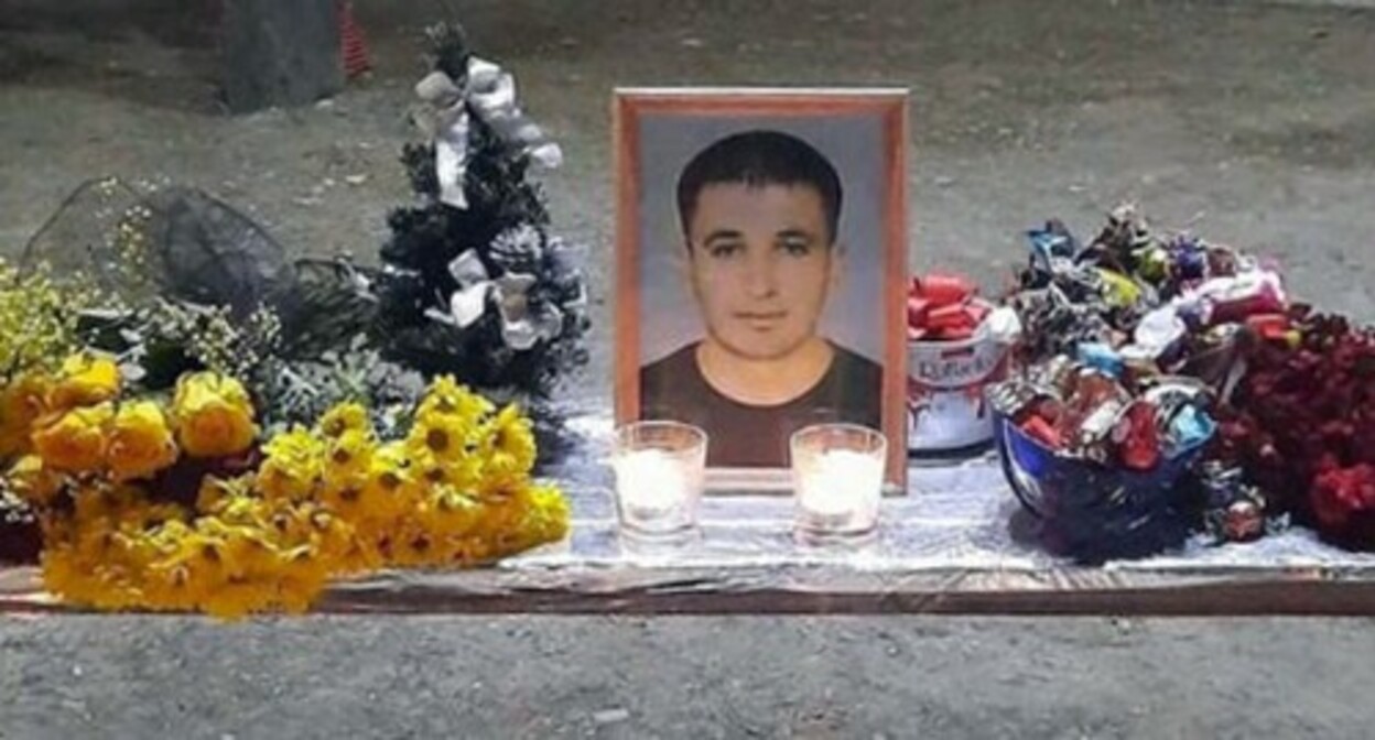 Flowers and candles at a portrait of Inal Djabiev. Screenshot: https://www.instagram.com/p/CKlMRR1rjtq/ Flowers and candles at a portrait of Inal Djabiev. Screenshot: https://www.instagram.com/p/CKlMRR1rjtq/