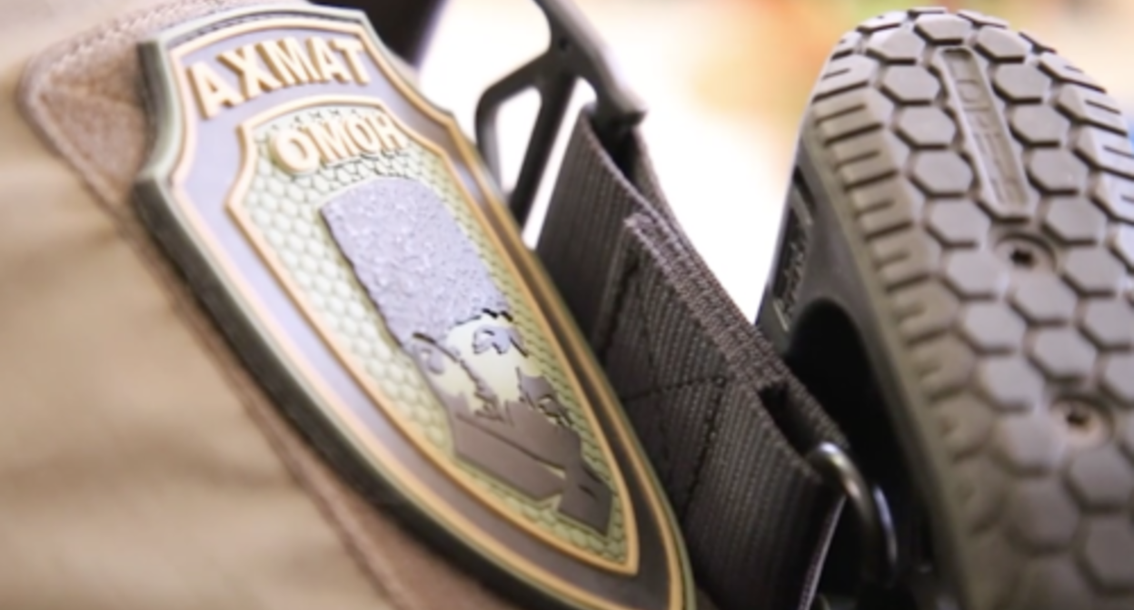 A badge of the "Akhmat-Grozny" OMON unit. Screenshot of the video in the post https://t.me/RKadyrov_95/3622 A badge of the "Akhmat-Grozny" OMON unit. Screenshot of the video in the post https://t.me/RKadyrov_95/3622