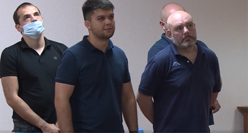 The convicts in Vladimir Tskaev's death case in the courtroom. Screenshot of the video by the Russian state news channel "Rossiya" https://alaniatv.ru/verhovnyj-sud-rso-a-smyagchil-prigovory-shesti-osuzhdyonnym-po-delu-tskaeva/ The convicts in Vladimir Tskaev's death case in the courtroom. Screenshot of the video by the Russian state news channel "Rossiya" https://alaniatv.ru/verhovnyj-sud-rso-a-smyagchil-prigovory-shesti-osuzhdyonnym-po-delu-tskaeva/