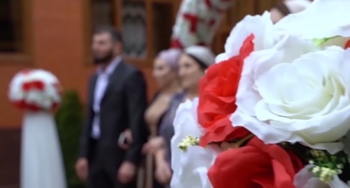 A wedding. Screenshot of the video from the YouTube channel "Chechen Weddings", Studio Sherkhan https://www.youtube.com/watch?v=gt-OQMRN2Mo A wedding. Screenshot of the video from the YouTube channel "Chechen Weddings", Studio Sherkhan https://www.youtube.com/watch?v=gt-OQMRN2Mo