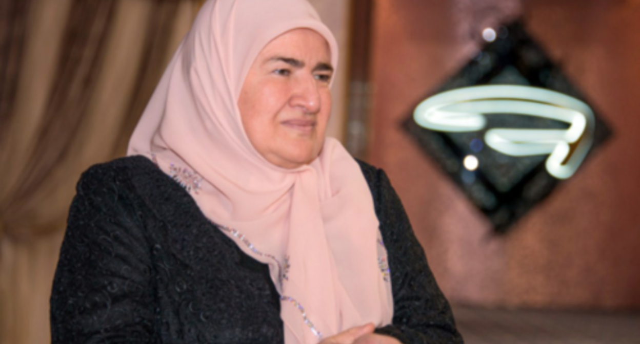Aimani Kadyrova. Screenshot of the photo published on the website of the Akhmat Kadyrov Fund on August 2, 2023 https://fondkadyrova.net/news/v-putin-vruchil-aimani-kadyrovoi-orden-p.html Aimani Kadyrova. Screenshot of the photo published on the website of the Akhmat Kadyrov Fund on August 2, 2023 https://fondkadyrova.net/news/v-putin-vruchil-aimani-kadyrovoi-orden-p.html
