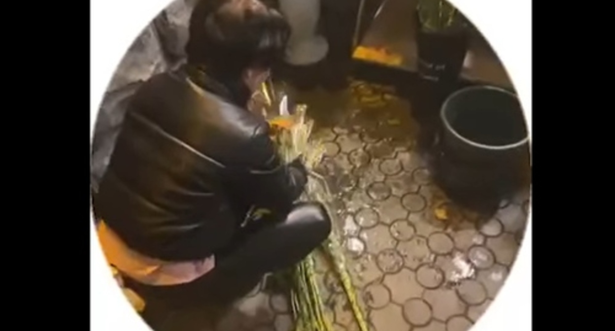 A participant of a video filmed in Yerevan who threw flowers on the asphalt with the words: "Grave for Ramzan Kadyrov." Screenshot of the video from Senik Muradyan's page on Facebook (the activities of the Meta Company, owning Facebook, Instagram, and WhatsApp, are banned in Russia) A participant of a video filmed in Yerevan who threw flowers on the asphalt with the words: "Grave for Ramzan Kadyrov." Screenshot of the video from Senik Muradyan's page on Facebook (the activities of the Meta Company, owning Facebook, Instagram, and WhatsApp, are banned in Russia)