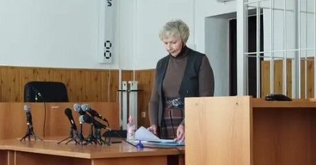 Elena Menchikova at the court. Screenshot of the website containing information about criminal cases against Jehovah's Witnesses* in Russia Elena Menchikova at the court. Screenshot of the website containing information about criminal cases against Jehovah's Witnesses* in Russia