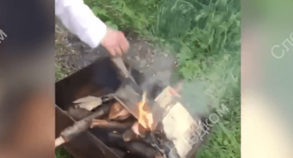 A young man puts the New Testament into the fire in a portable grill. Screenshot of the video posted by the Branch for the Stavropol Territory of the Investigating Committee of the Russian Federation on May 3, 2024 https://t.me/su_skr26/3115 A young man puts the New Testament into the fire in a portable grill. Screenshot of the video posted by the Branch for the Stavropol Territory of the Investigating Committee of the Russian Federation on May 3, 2024 https://t.me/su_skr26/3115