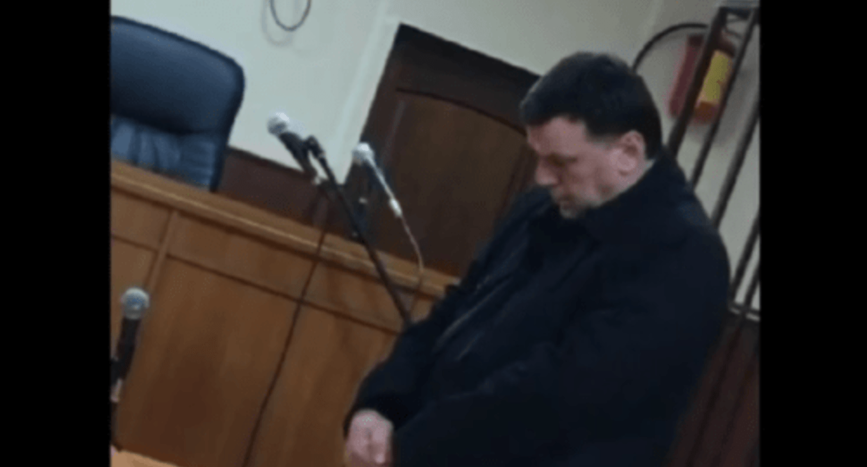 Tagir Velagaev in a court. Screenshot of a video posted on March 19, 2022 https://www.youtube.com/watch?v=NlNf4EyaD80 Tagir Velagaev in a court. Screenshot of a video posted on March 19, 2022 https://www.youtube.com/watch?v=NlNf4EyaD80
