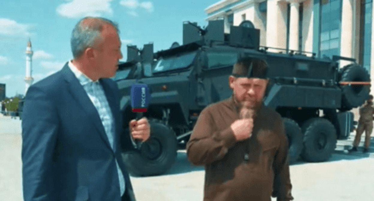 Kadyrov interviewed next to an “Akhmat-mobile”. Screenshot of a video https://rutube.ru/video/261ff682dd66eb031617d9a596421c4c/?t=5 Kadyrov interviewed next to an “Akhmat-mobile”. Screenshot of a video https://rutube.ru/video/261ff682dd66eb031617d9a596421c4c/?t=5