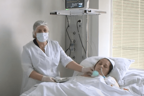 Madina Ausheva in a hospital ward. Screenshot of a video by НТРК YouTube Madina Ausheva in a hospital ward. Screenshot of a video by НТРК YouTube