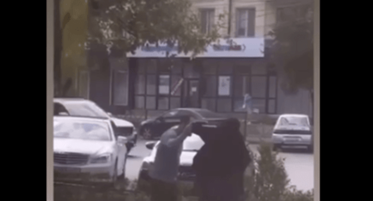 A man tried to remove niqab
from a Muslim woman in Dagestan. Screenshot of a video posted by the Telegram channel "Chto Tam u Dagestantsev" (What's Going On With Dagestanis) on August 28, 2024 https://t.me/dagestanRD/48650 A man tried to remove niqab
from a Muslim woman in Dagestan. Screenshot of a video posted by the Telegram channel "Chto Tam u Dagestantsev" (What's Going On With Dagestanis) on August 28, 2024 https://t.me/dagestanRD/48650