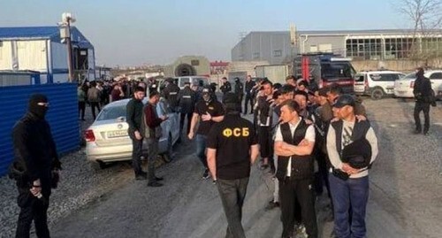 A raid aimed to find illegal migrants. Photo by the press service of the Russia's Federal Security Service in the Rostov region A raid aimed to find illegal migrants. Photo by the press service of the Russia's Federal Security Service in the Rostov region