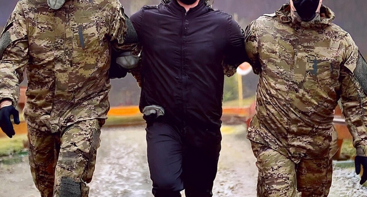 The detention of a man. Picture made by Photoshop The detention of a man. Picture made by Photoshop
