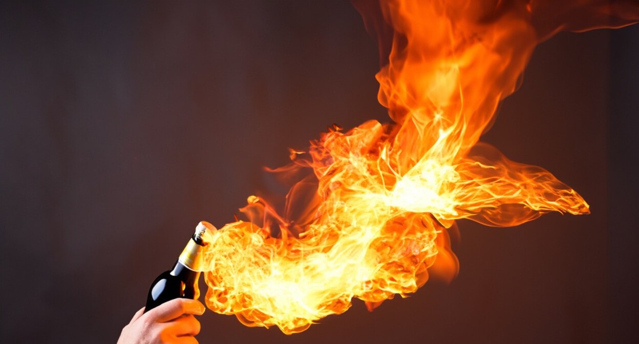 A man with a Molotov cocktail. Picture made in Photoshop by the "Caucasian Knot" A man with a Molotov cocktail. Picture made in Photoshop by the "Caucasian Knot"