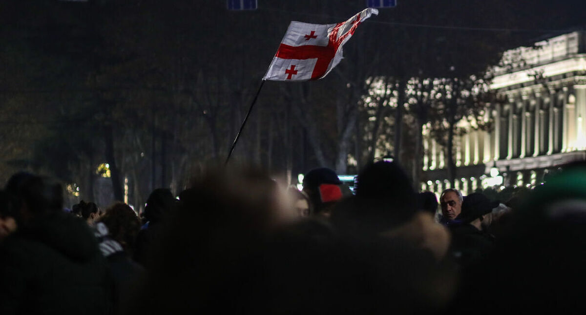 The flag of Georgia. December 2024. Photo by Aziz Karimov for the "Caucasian Knot" The flag of Georgia. December 2024. Photo by Aziz Karimov for the "Caucasian Knot"