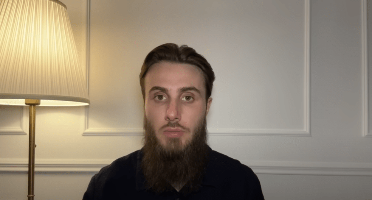 Mukhammad Abdurakhmanov. A frame from a video posted on his YouTube channel on May 1, 2025, https://www.youtube.com/watch?v=J61t-BH8AKo.
Mukhammad Abdurakhmanov. A frame from a video posted on his YouTube channel on May 1, 2025, https://www.youtube.com/watch?v=J61t-BH8AKo.