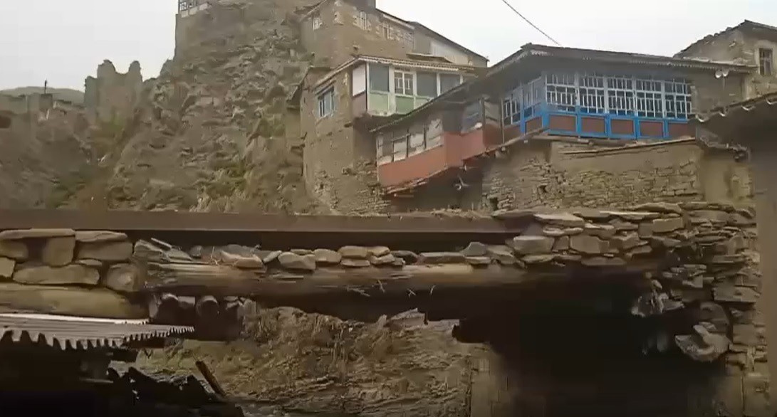 The collapsed bridge in the village of Kunki: screenshot from the video provided by the villagers.