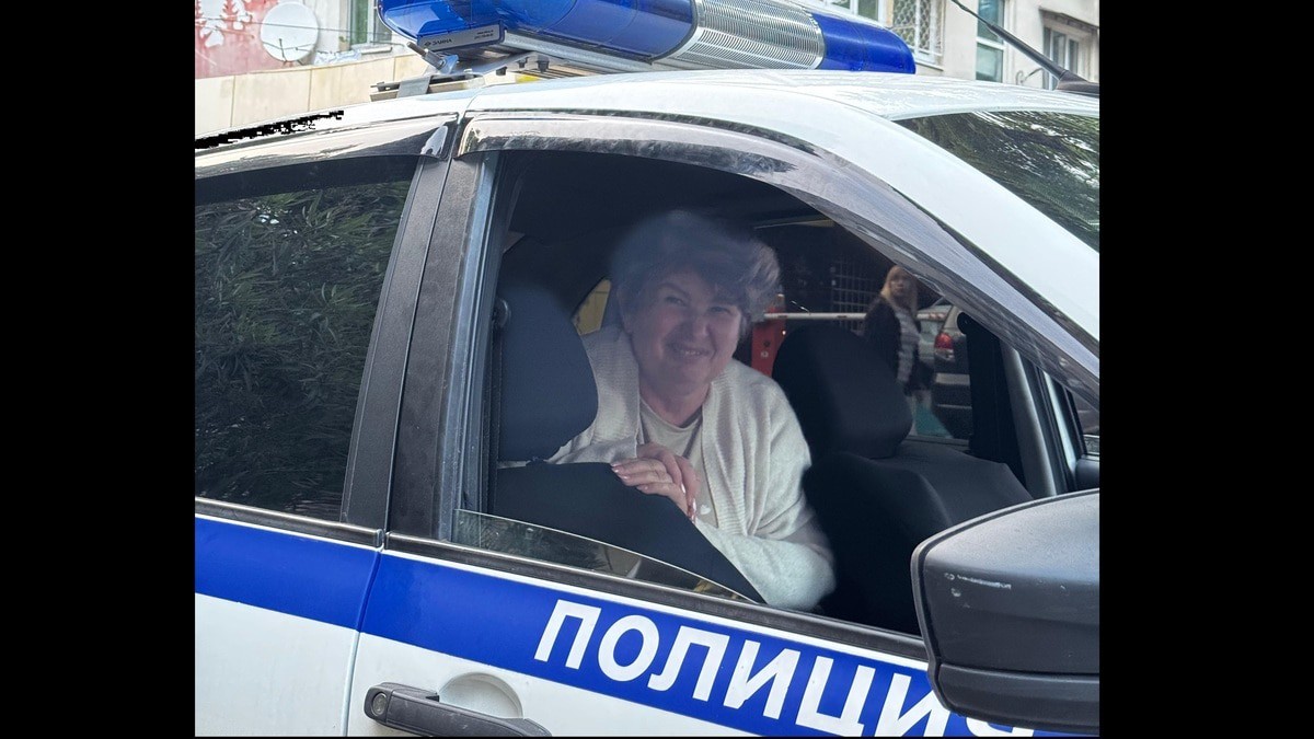 Activist Tatyana Polivanova in a police car. Photo provided by Polivanova's son Activist Tatyana Polivanova in a police car. Photo provided by Polivanova's son