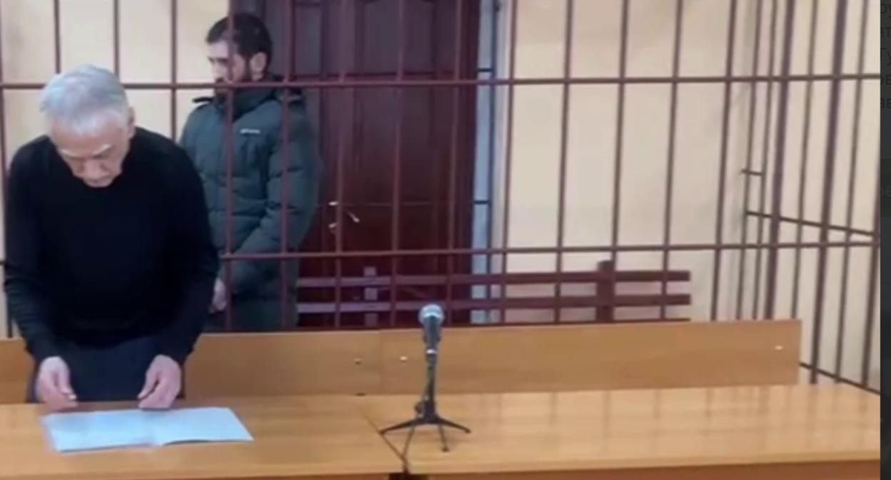 The court has arrested a suspect in the woman's murder (behind bars). Still from video from February 4, 2026, https://t.me/Femida_Dagestana/366