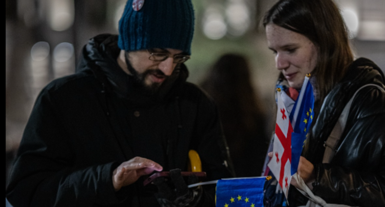 Protesters outside the Georgian Parliament. Photo screenshot from Publika https://www.facebook.com/photo?fbid=1695037485229128&set=pcb.1695037538562456