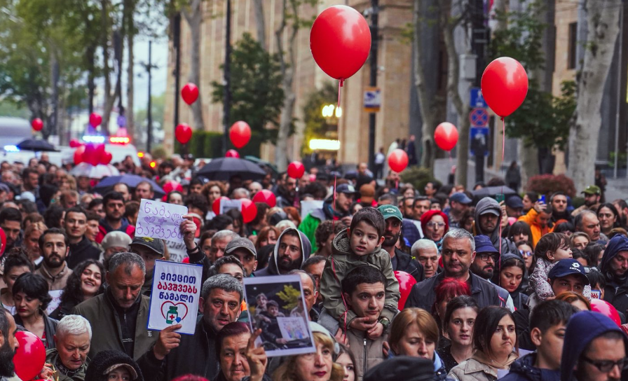 March in Tbilisi. Screenshot of Mo Se's photo from May 3, 2026, https://www.facebook.com/photo?fbid=4297407353907337&set=pcb.4297408117240594