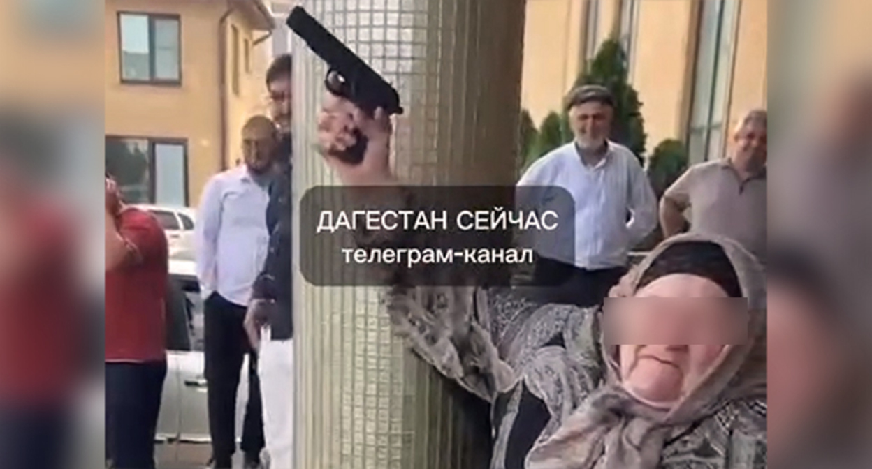 An elderly resident of Khasavyurt fires a gun during a wedding. Frame from the video https://www.instagram.com/p/DapuiBgM6xA (the activities of the company Meta (which owns Facebook, Instagram, and WhatsApp) are banned in Russia)