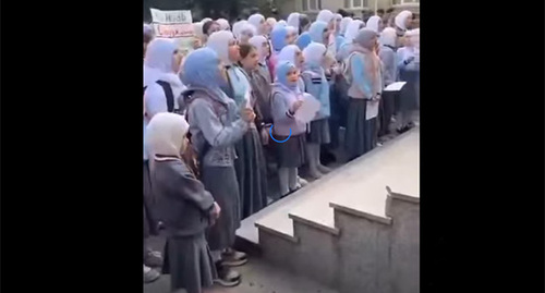 Schoolgirls in hijabs perform the national anthem of Azerbaijan in the yard of school No. 130. Screenshot of the video https://www.facebook.com/reel/1771787874050906 Schoolgirls in hijabs perform the national anthem of Azerbaijan in the yard of school No. 130. Screenshot of the video https://www.facebook.com/reel/1771787874050906